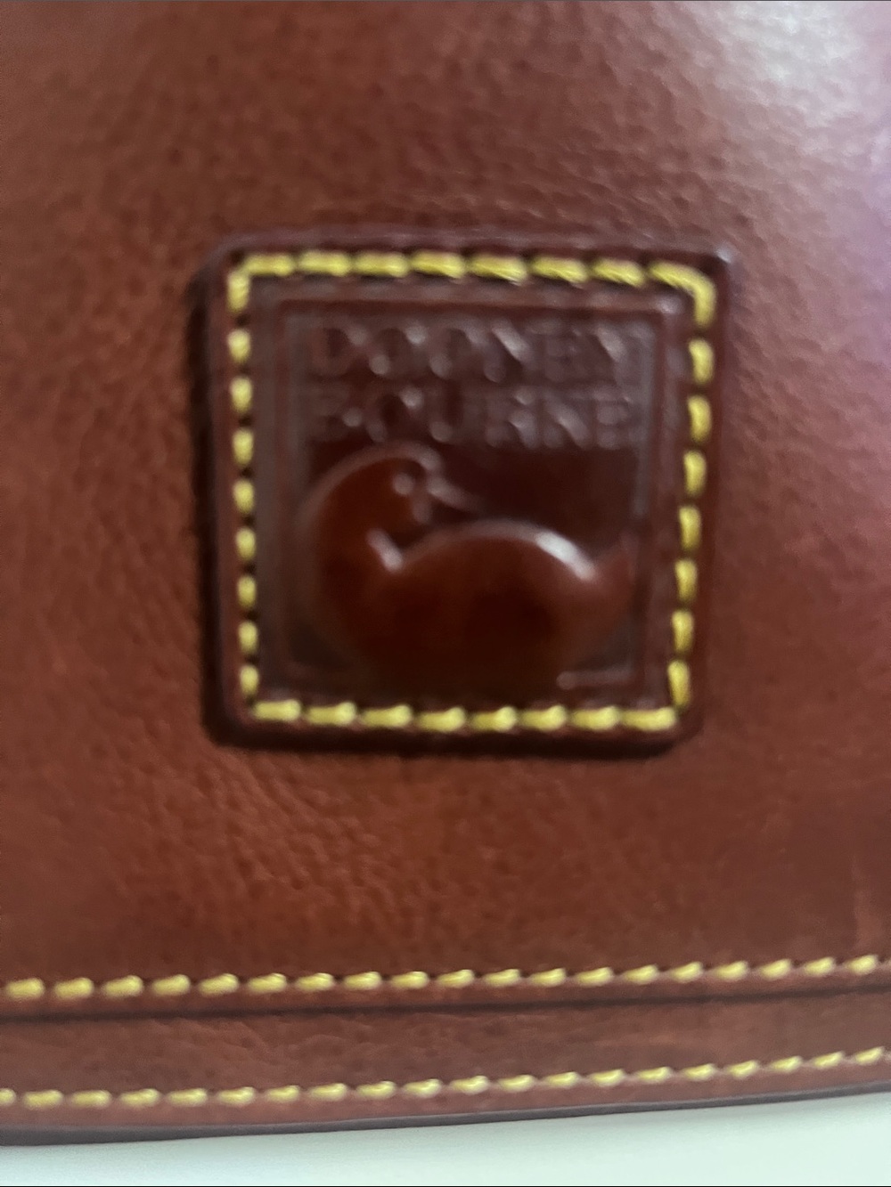 Dooney & Bourke Brown Leather crossbody with Yellow Stitching